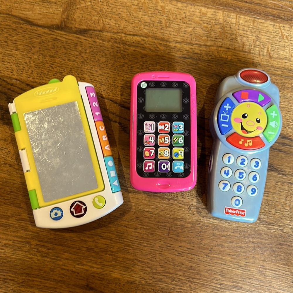 Multi-pack take along toys. Includes remote, phone and misc. book type toy.